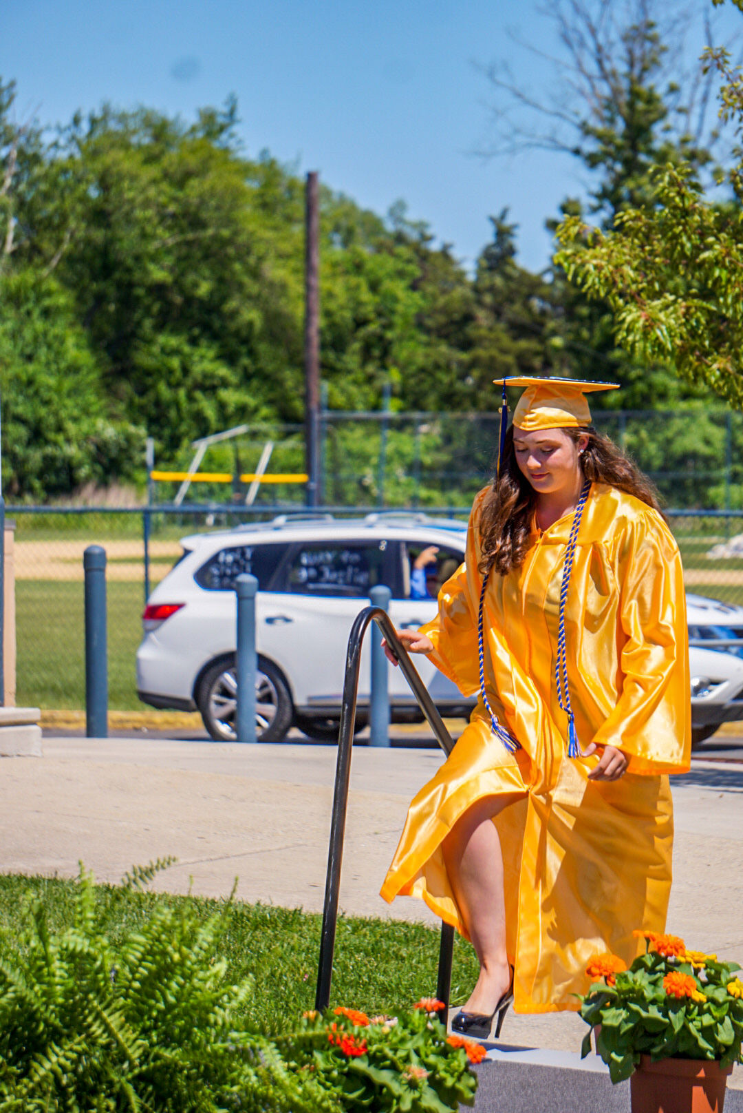 Holy Spirit drive-through diploma pickup